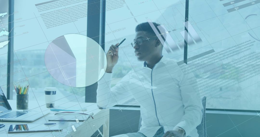 Businessman Analyzing Financial Data with Technology Interface