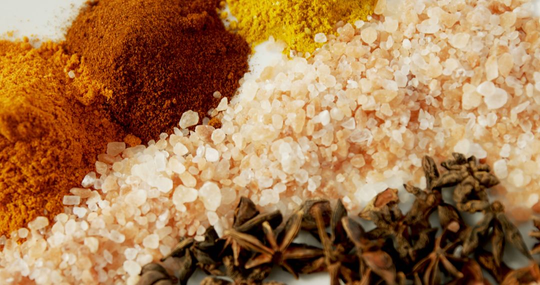 Assorted Spices and Seasonings Arranged on White Surface - Free Images, Stock Photos and Pictures on Pikwizard.com