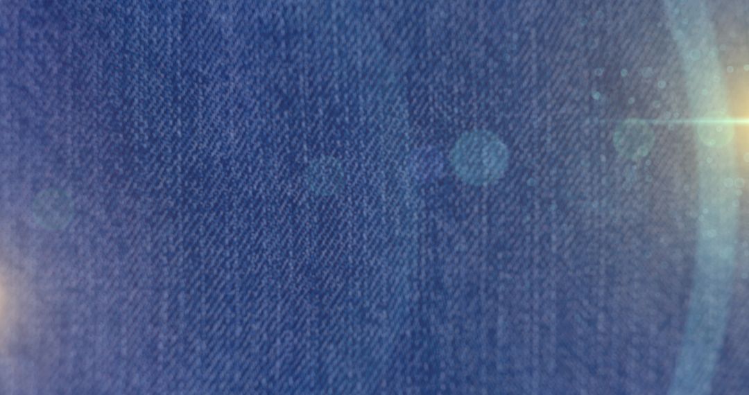 Abstract Light Spots Over Denim Fabric