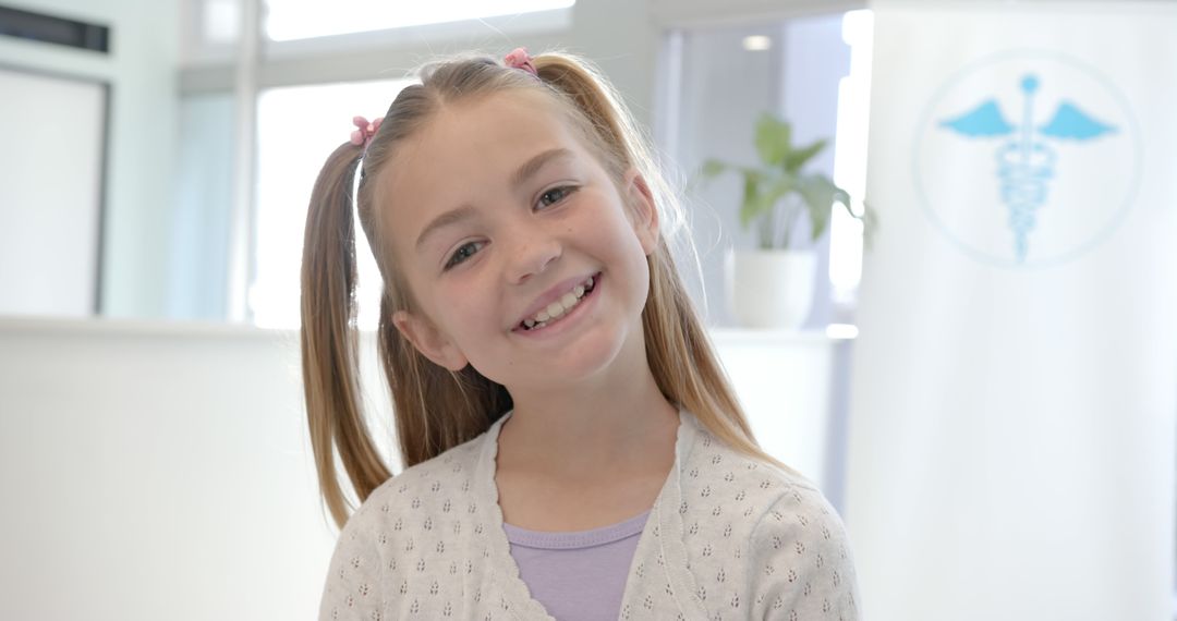 Smiling Girl Patient in Hospital Reception