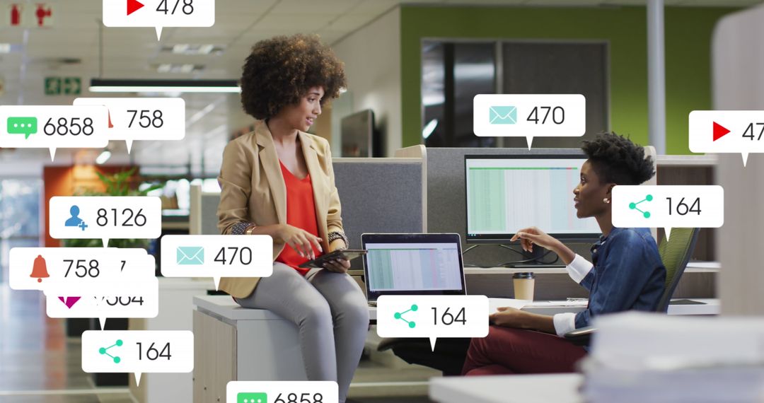 Coworkers Engaged in Digital Strategy with Notification Overlays