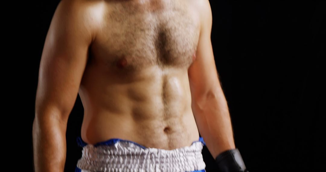 Close-Up of Athletic Man in Boxing Gear - Free Images, Stock Photos and Pictures on Pikwizard.com