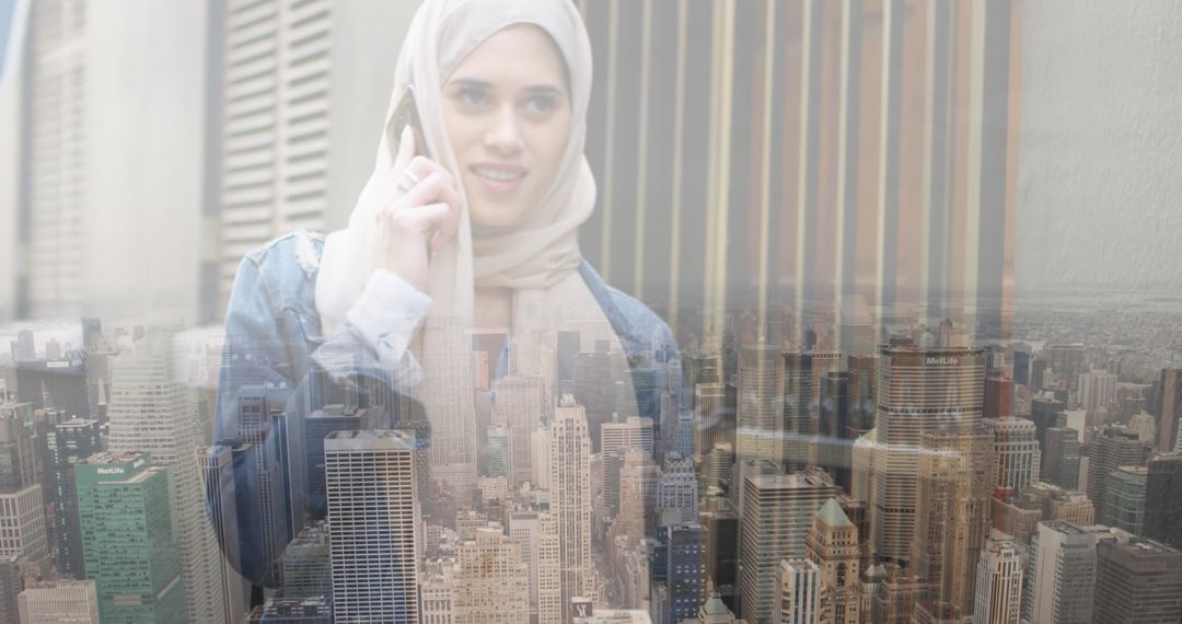Young Woman in Hijab Communicating Over City Skyline