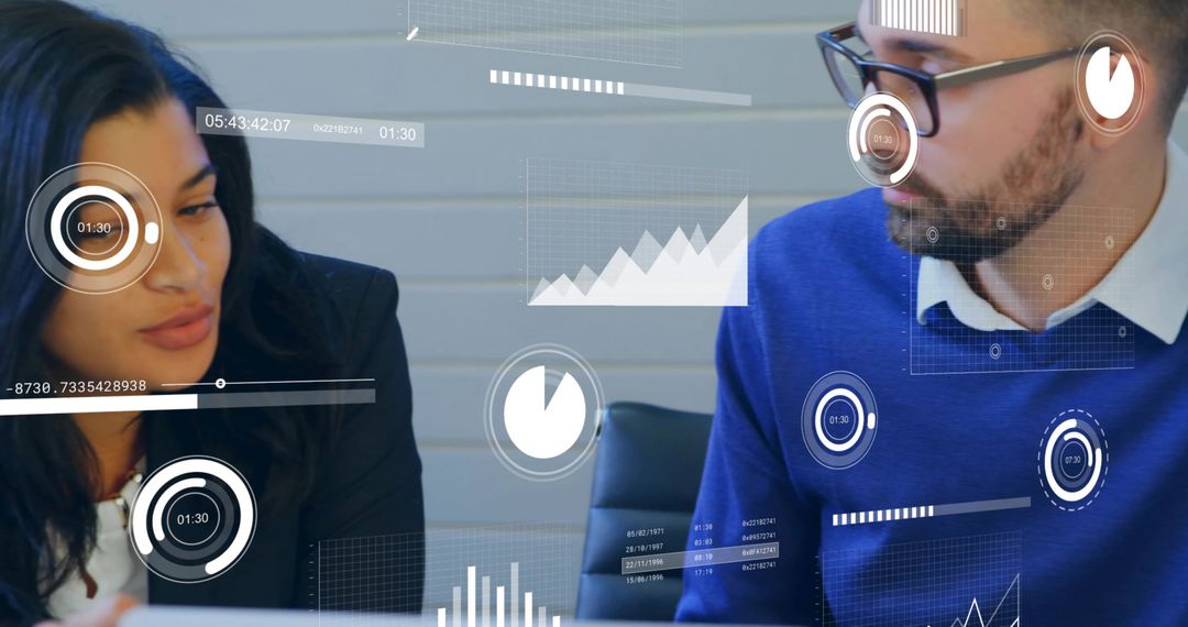 Business Professionals Analyzing Digital Data During Meeting