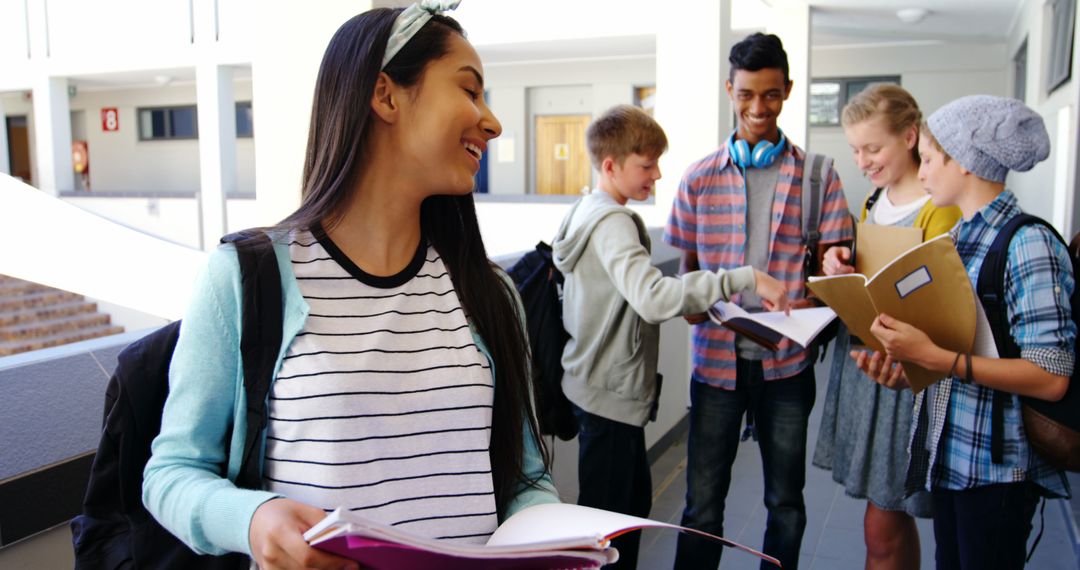 Diverse Students Interacting in School Corridor