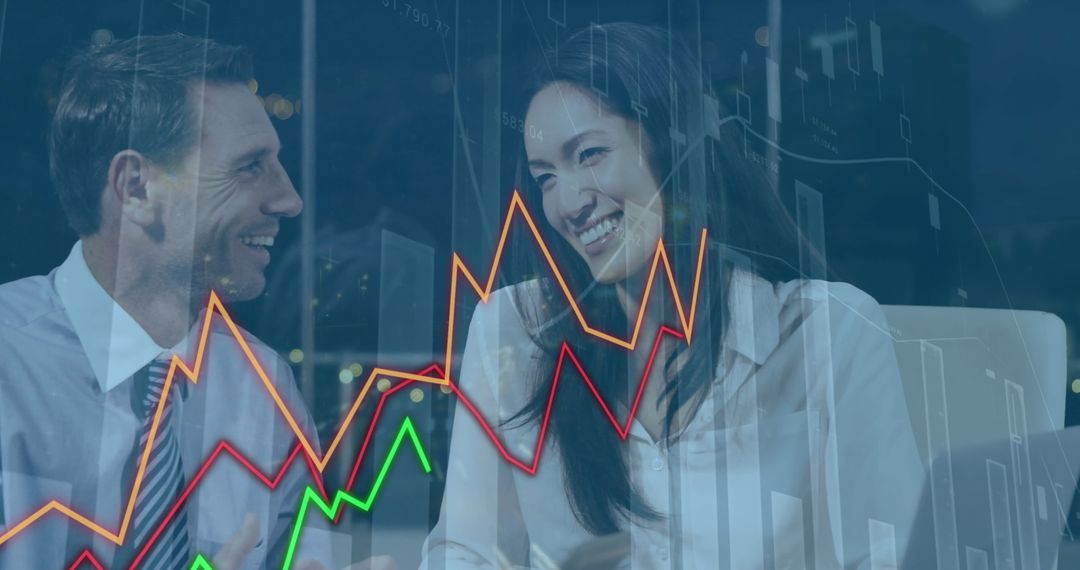 Business Professionals Analyzing Financial Graphs in Office