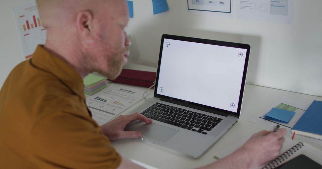 Man Typing on Laptop in Home Office with Blank White Screen - Free Images, Stock Photos and Pictures on Pikwizard.com