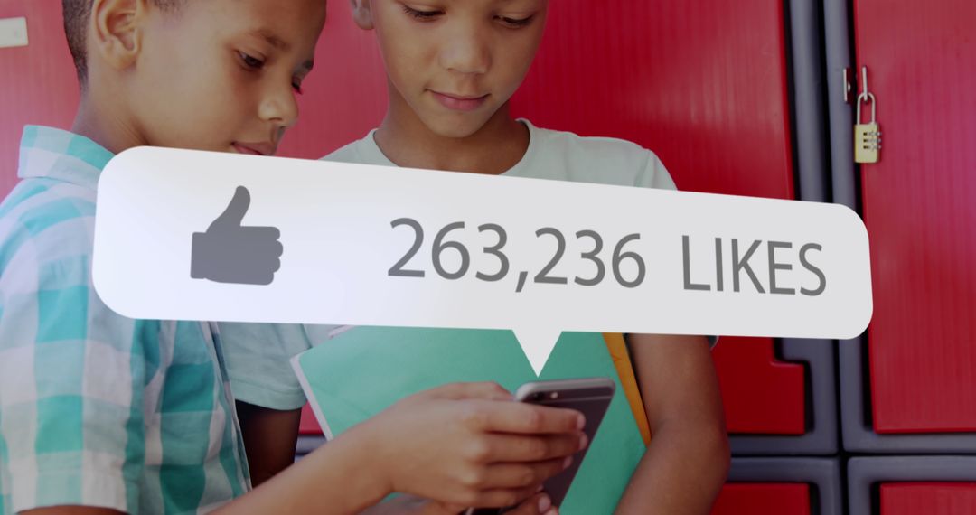 Boys Engaged with Smartphone Displaying Large Social Media Likes