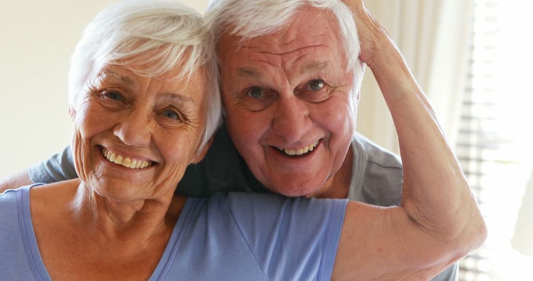 Joyful Senior Couple Embracing with Love
