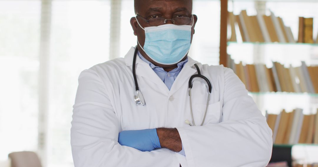 Confident Doctor Wearing Mask and Stethoscope in Office - Free Images, Stock Photos and Pictures on Pikwizard.com