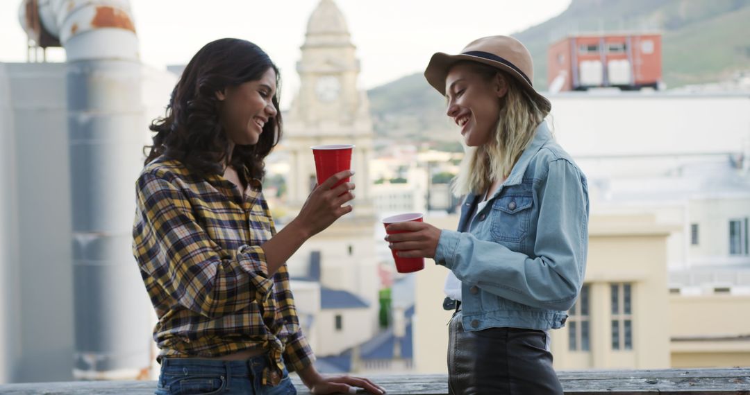 Joyful Friends Socializing on Rooftop