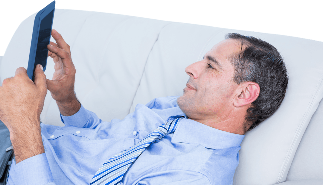 Transparent Relaxed Businessman Using Tablet on Sofa