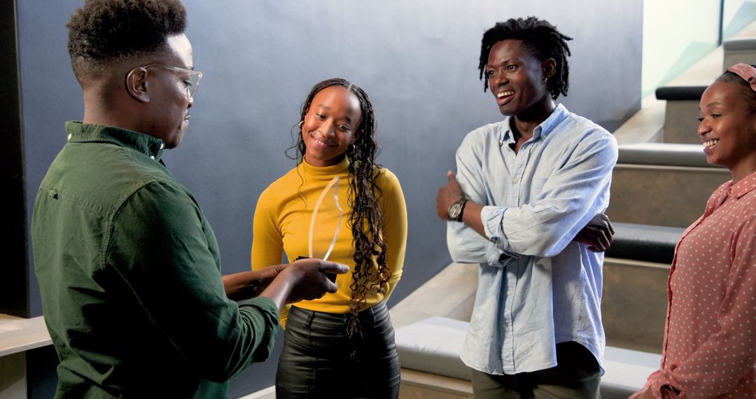 Diverse Team Engaging in a Fun Office Meeting