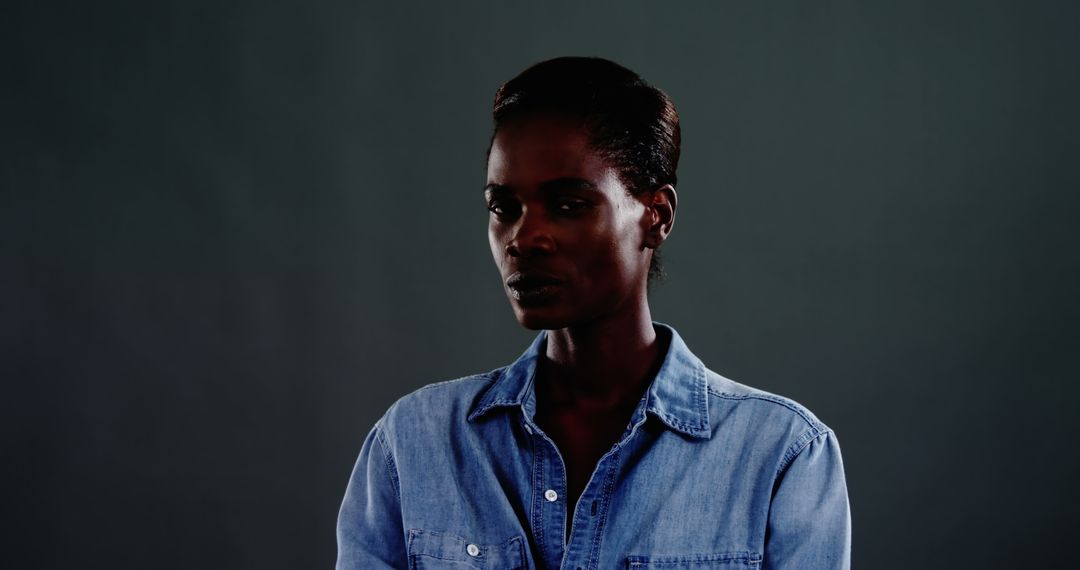 Portrait of Thoughtful African American Man Wearing Denim Shirt - Free Images, Stock Photos and Pictures on Pikwizard.com