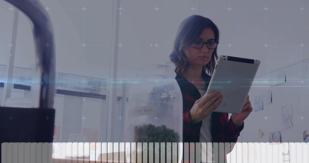 Female Scientist Analyzing Research Data on Tablet in Modern Laboratory