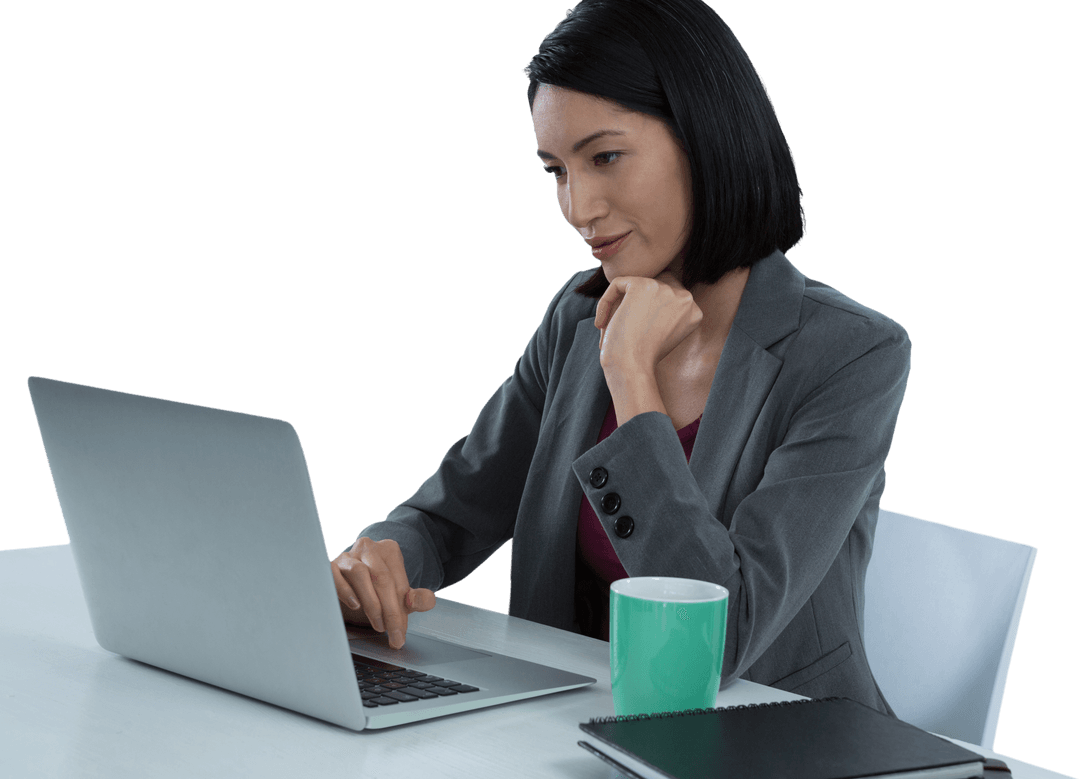 Confident Businesswoman Using Laptop With Focused Attention