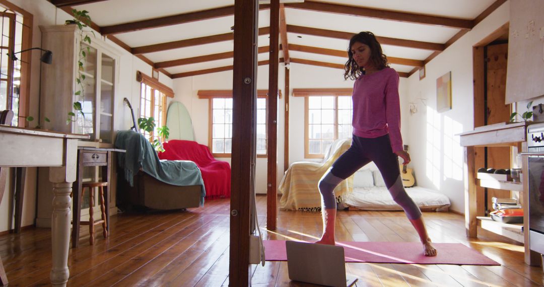 Woman Practicing Yoga at Home in Brightly Lit Room - Free Images, Stock Photos and Pictures on Pikwizard.com