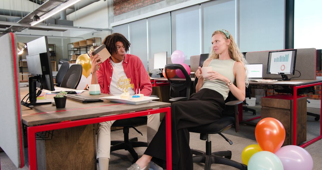 Team Celebrating in Office with Balloons and Drinks