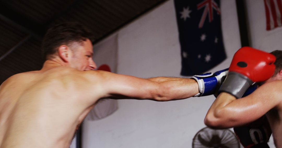 Competitive Boxers Sparring During Intense Training Session - Free Images, Stock Photos and Pictures on Pikwizard.com