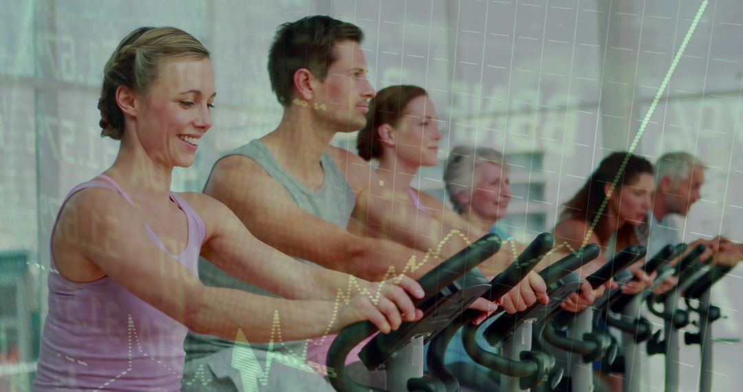 Group Exercise on Stationary Bikes in Fitness Studio Reflection