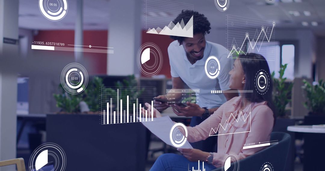 Business People Collaborating With Data Visualizations in Modern Office