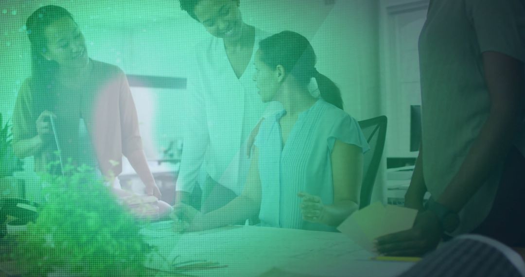 Diverse Businesswomen Collaborating on Design Project in Modern Office