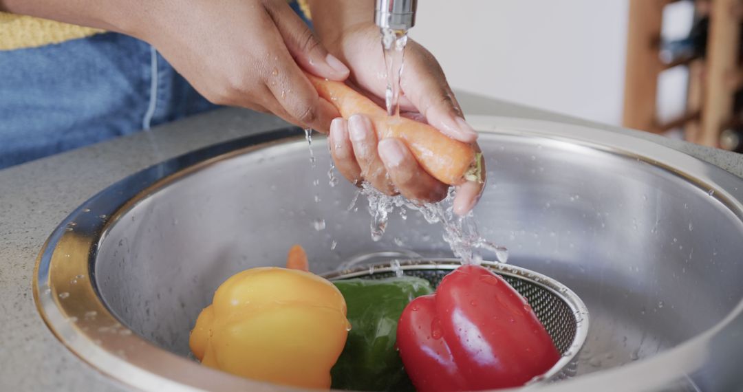 Washing Fresh Vegetables Under Kitchen Faucet - Free Images, Stock Photos and Pictures on Pikwizard.com