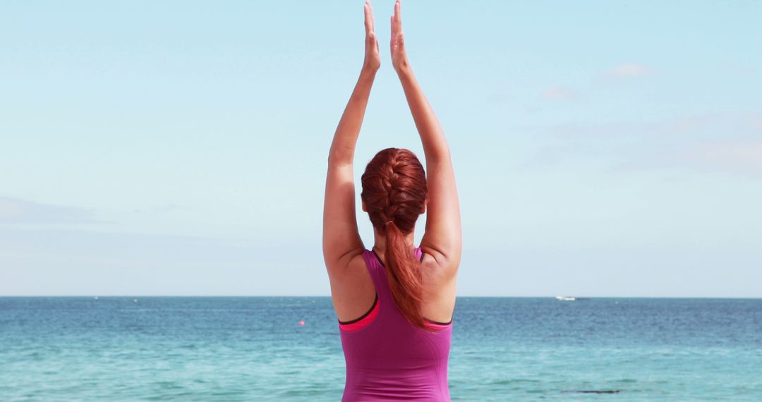 Woman Practicing Yoga on Beach with Ocean View - Free Images, Stock Photos and Pictures on Pikwizard.com