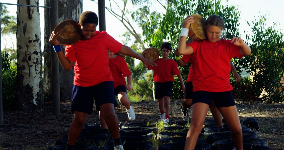 Children Participating in Outdoor Obstacle Course Exercise Activity - Free Images, Stock Photos and Pictures on Pikwizard.com