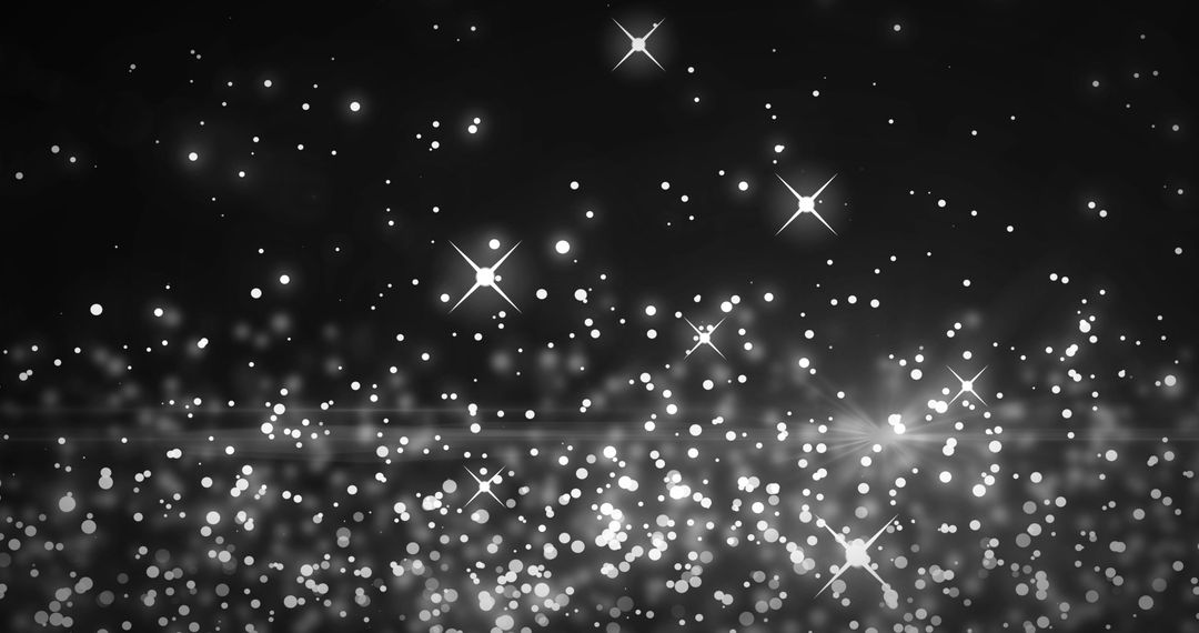 Glowing White Spots of Light on Black Background