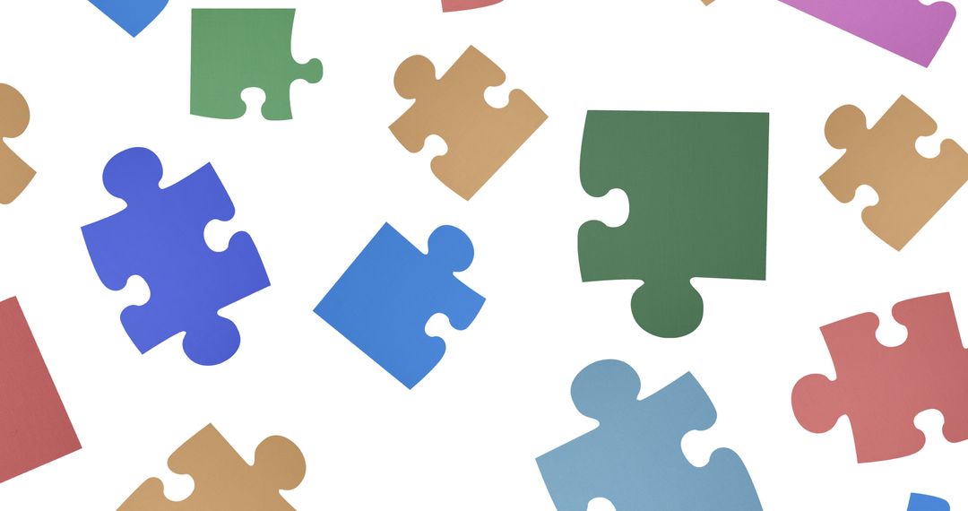 Colorful Puzzle Pieces Falling on White Background