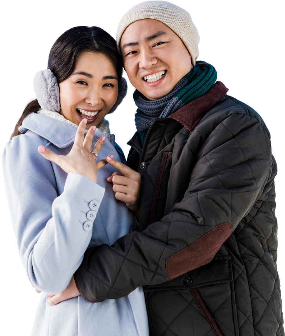 Excited Couple Celebrating Engagement in Winter Attire Transparent Background - Download Free Stock Images Pikwizard.com