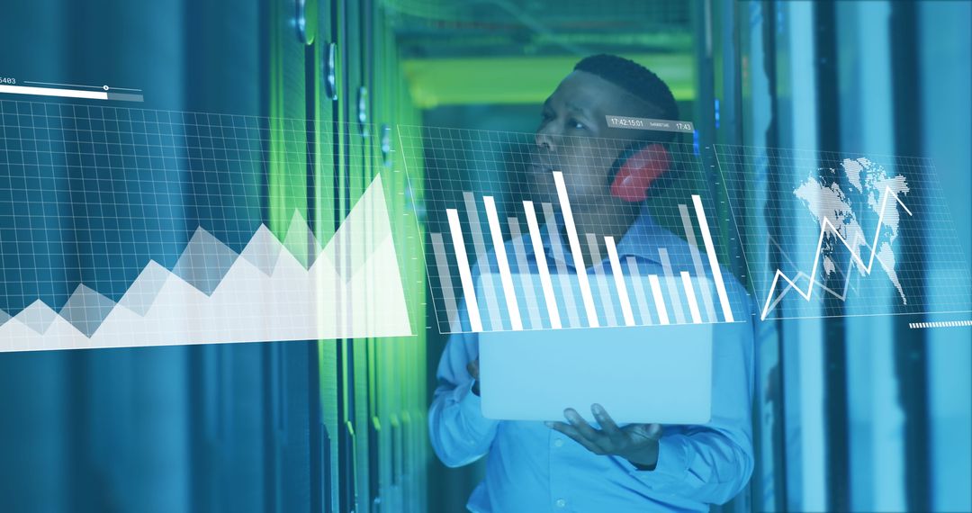 IT Technician Analyzing Data by Computer Servers
