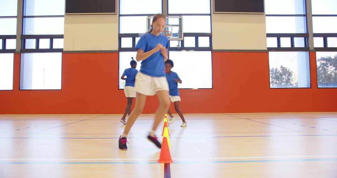 Children Practicing Gym Drills in School Gymnasium