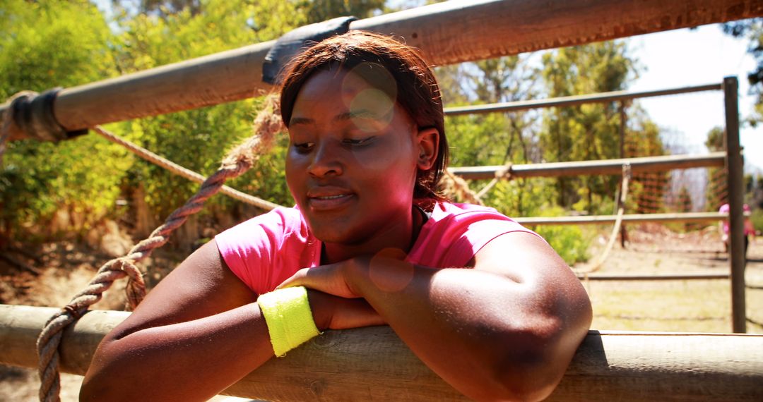 Woman Resting After Completing Obstacle Course in Outdoor Park - Free Images, Stock Photos and Pictures on Pikwizard.com