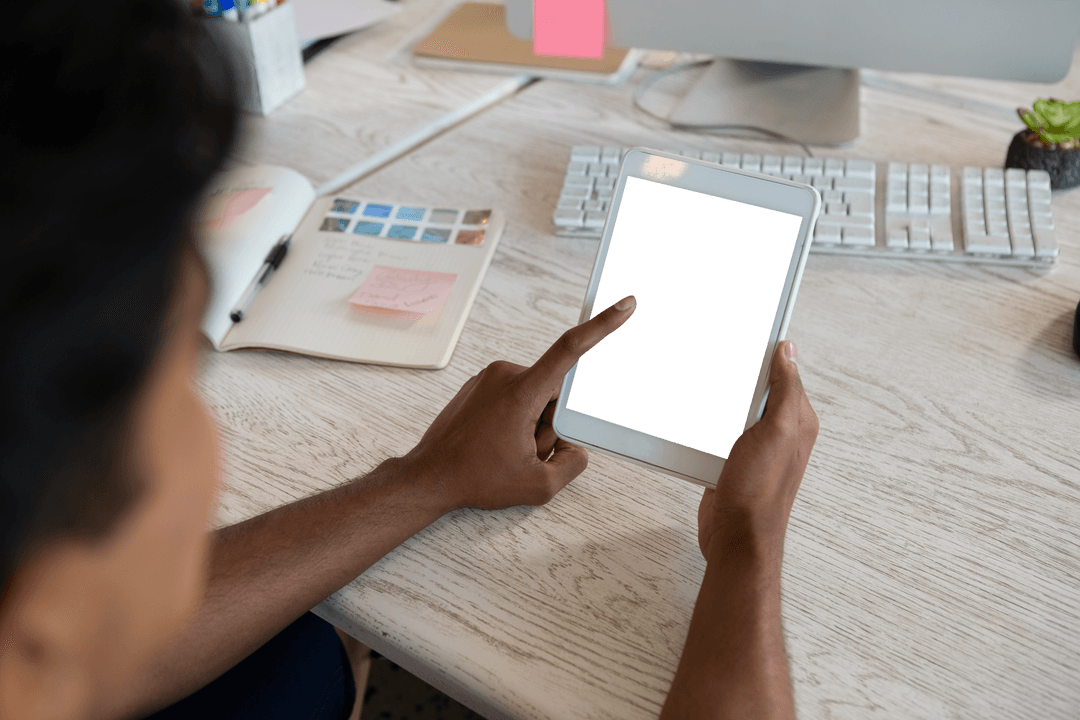 Man Browsing on Transparent Screen Tablet in Modern Office