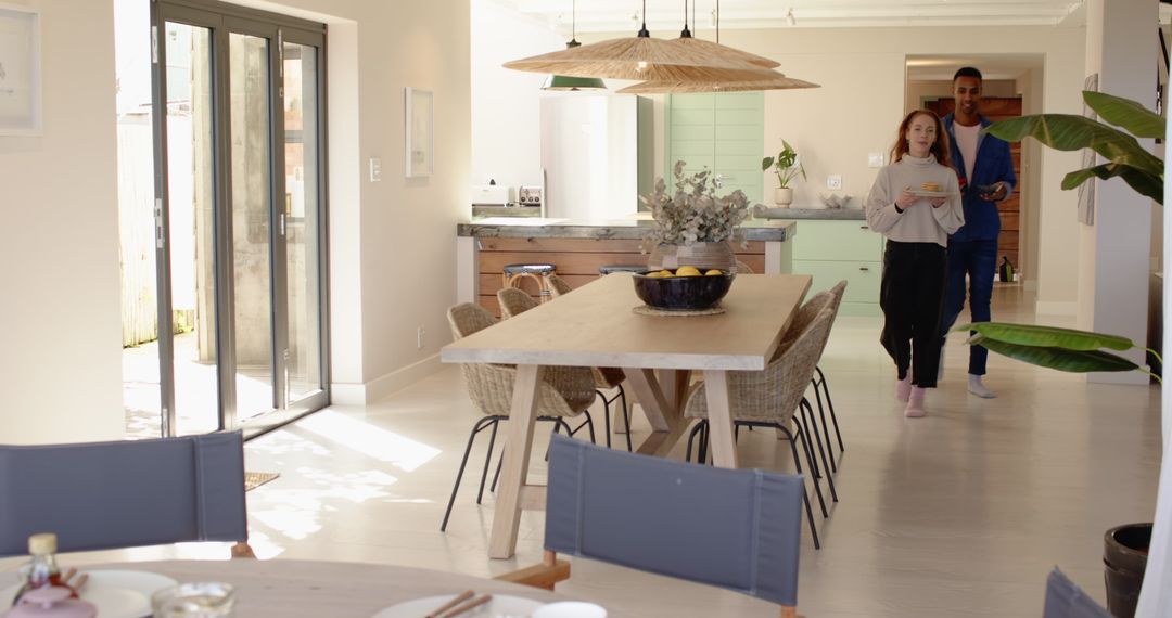 Cheerful Couple in Cozy Scandinavian Dining Space with Natural Light