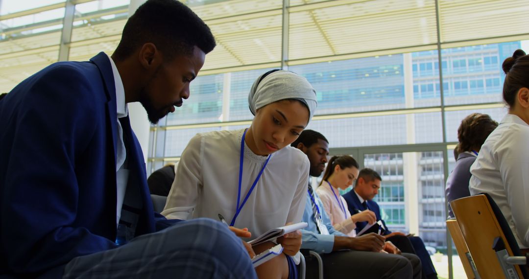 Diverse Business Team Engaged in Intense Seminar Collaboration