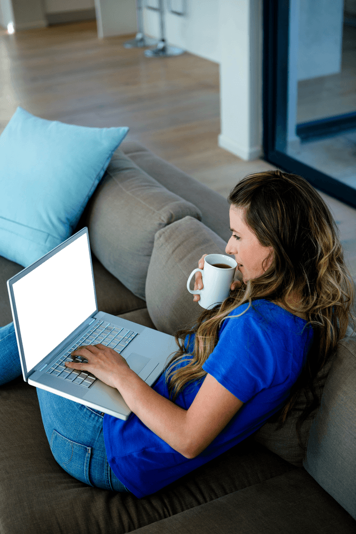 Transparent Laptop Screen with Woman Relaxing on Sofa