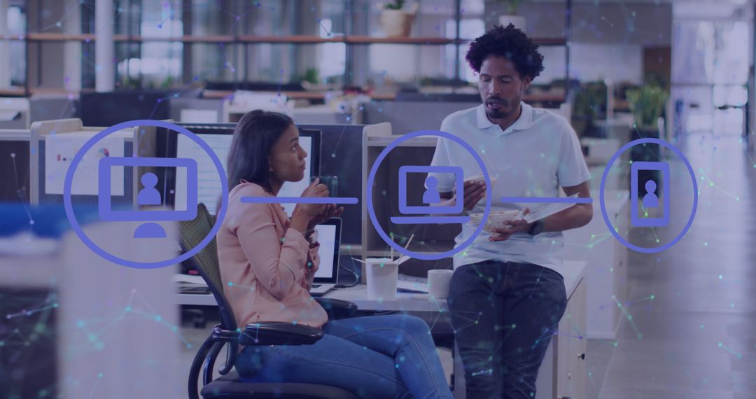 Diverse Team Engaging in Digital Interaction in Modern Office