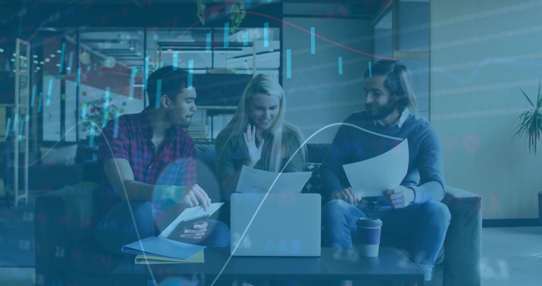 Young Professionals Collaborating in Office Lounge