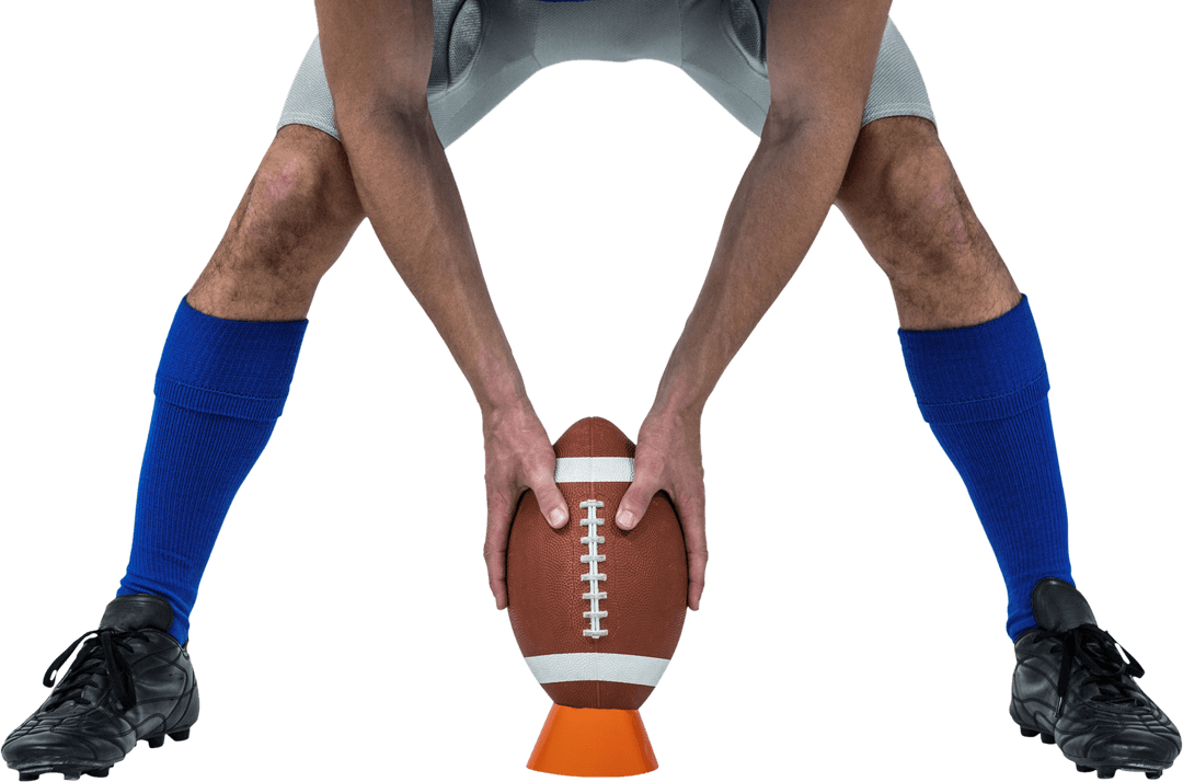 American Football Player Setting Ball for Kick Transparent Background