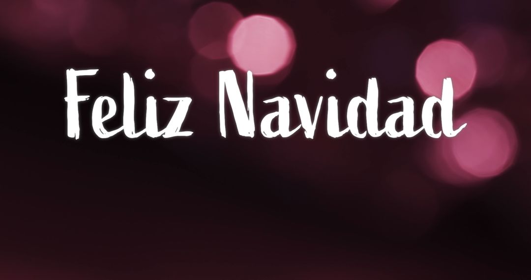 Feliz Navidad Greetings on Pink Lights Background