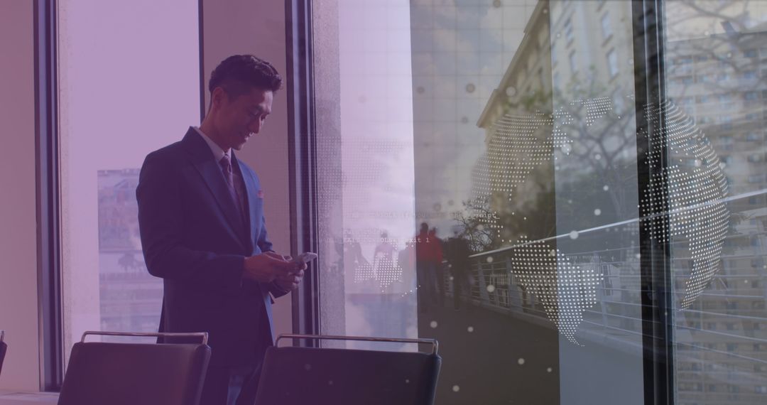 Asian Businessman Using Smartphone with Global Data Overlay