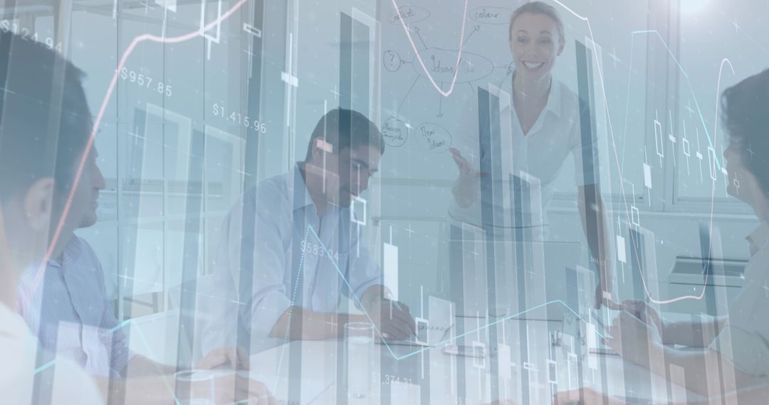 Business Team Collaborating with Digital Graphs Overlay