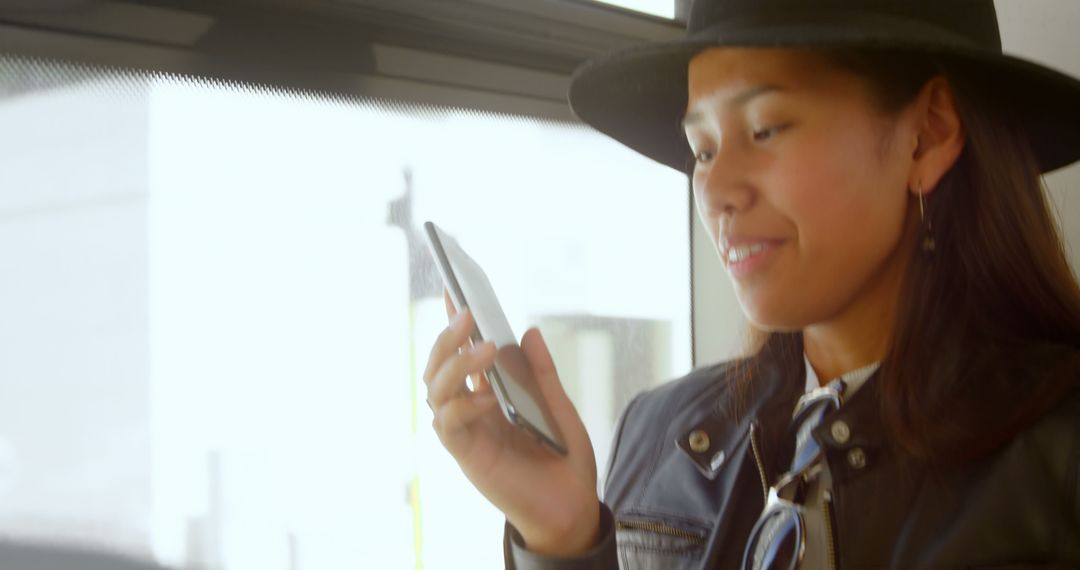 Young Woman Talking on Phone in Public Transport - Free Images, Stock Photos and Pictures on Pikwizard.com