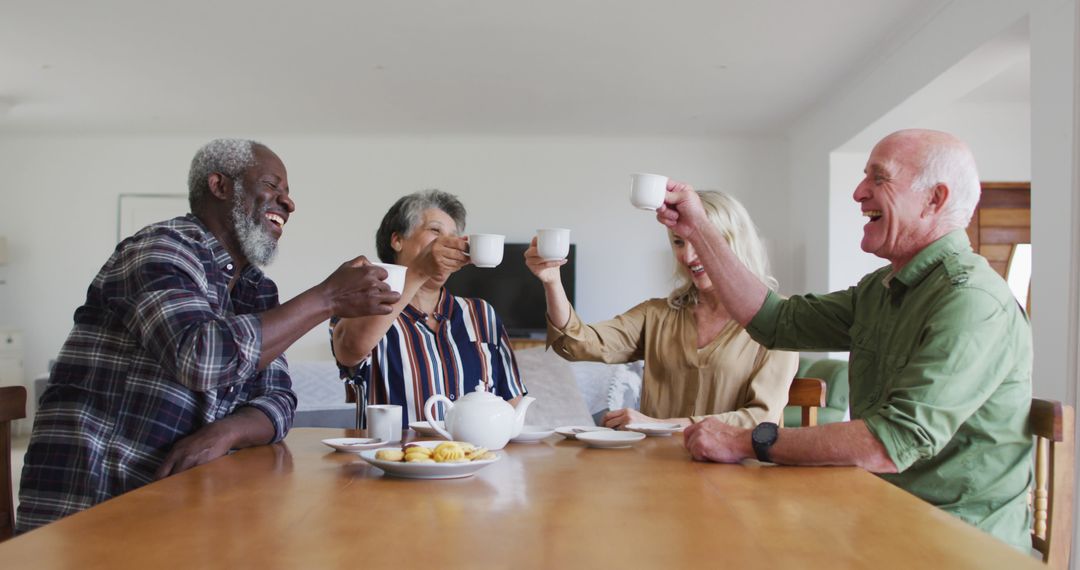 Senior Friends Enjoying Tea Party Together at Table - Free Images, Stock Photos and Pictures on Pikwizard.com