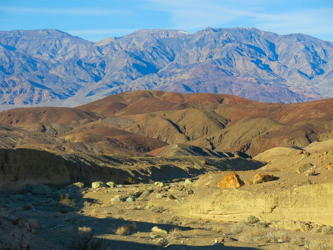 Colorful Desert Landscape with Mountain Ranges in Background - Free Images, Stock Photos and Pictures on Pikwizard.com