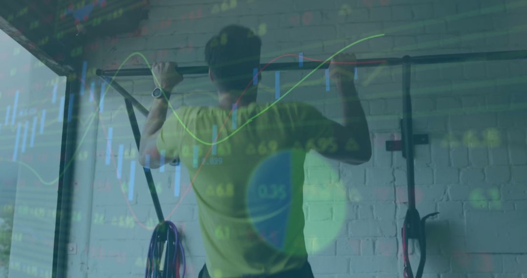 Man Doing Pull-Ups with Data Overlay: Business and Fitness Concept