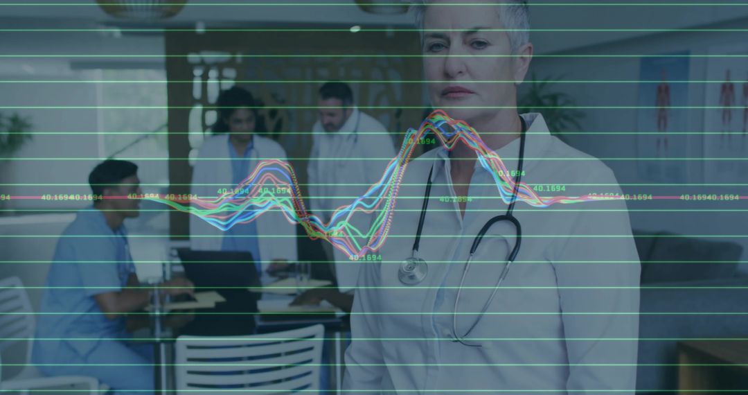 Senior Doctor Evaluating Data in Hospital with Team Collaboration